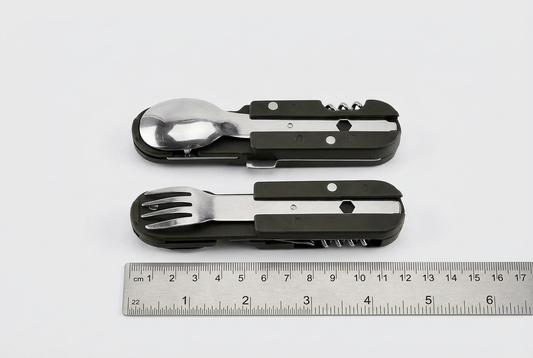Range Survival Kit utensils folded beside a ruler to show compact packed dimensions